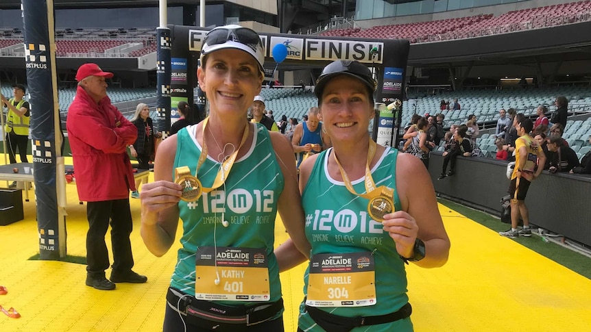 Kathy Fuller and Narelle Pell after finishing the Adelaide marathon