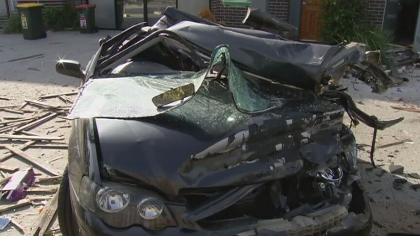 Crash wrecked five cars and damaged three townhouses