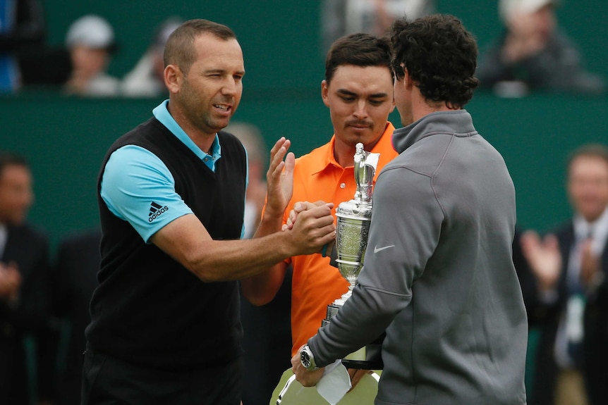 Rory McIlroy and Sergio Garcia shake hands after the 2014 British Open