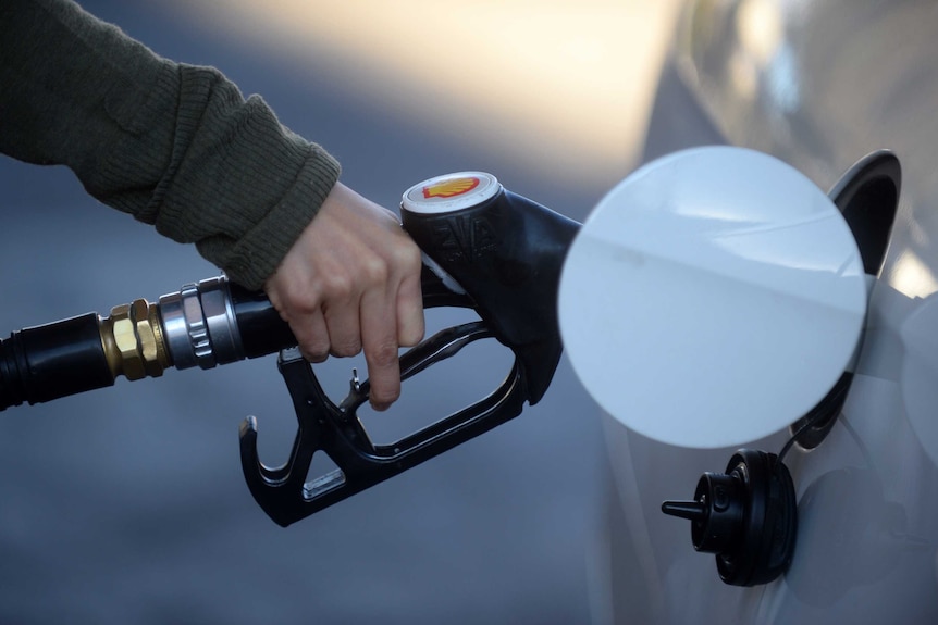 Car being filled up at petrol station