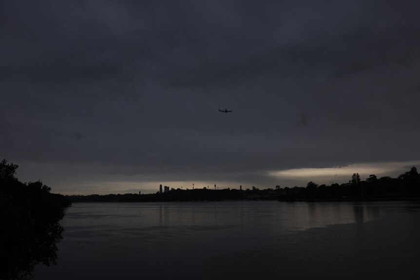 a dark Sydney city skyline after a powerful storm swept through