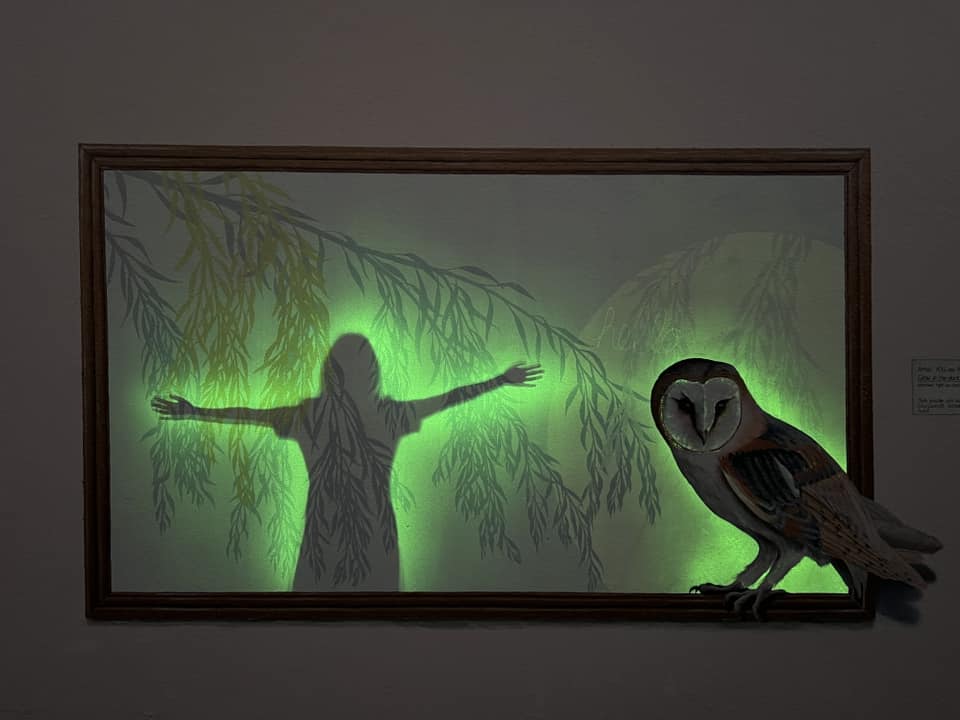 An outline of a body in glow-in-the-dark paint.