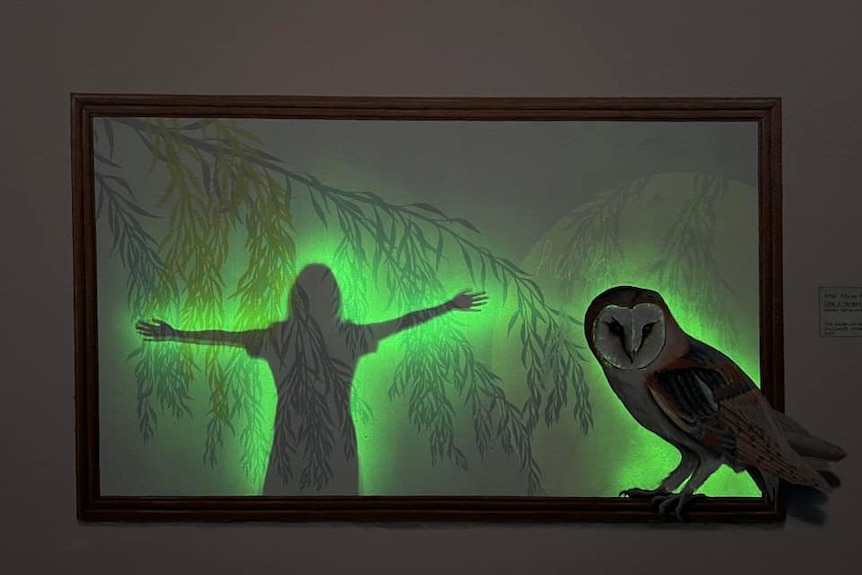 An outline of a body in glow-in-the-dark paint.