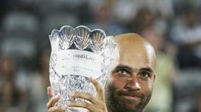 James Blake poses with the Sydney International trophy