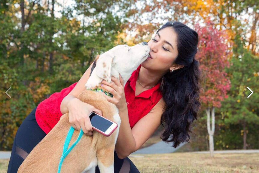 Nazanin Zinouri hugs and kisses her dog Dexter.