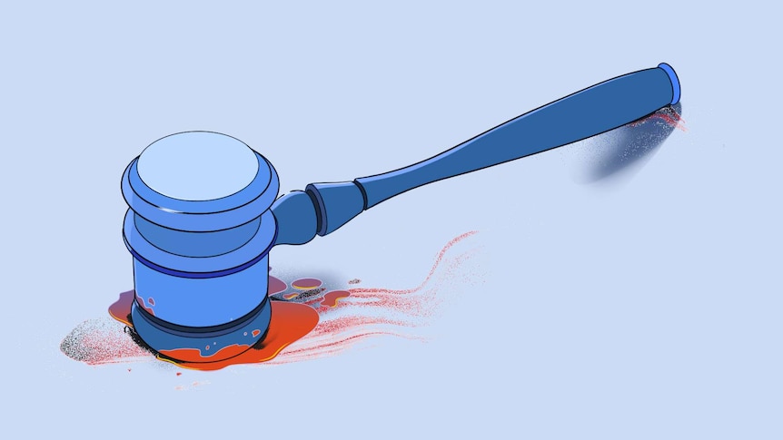 An illustration shows a gavel with blood on one end