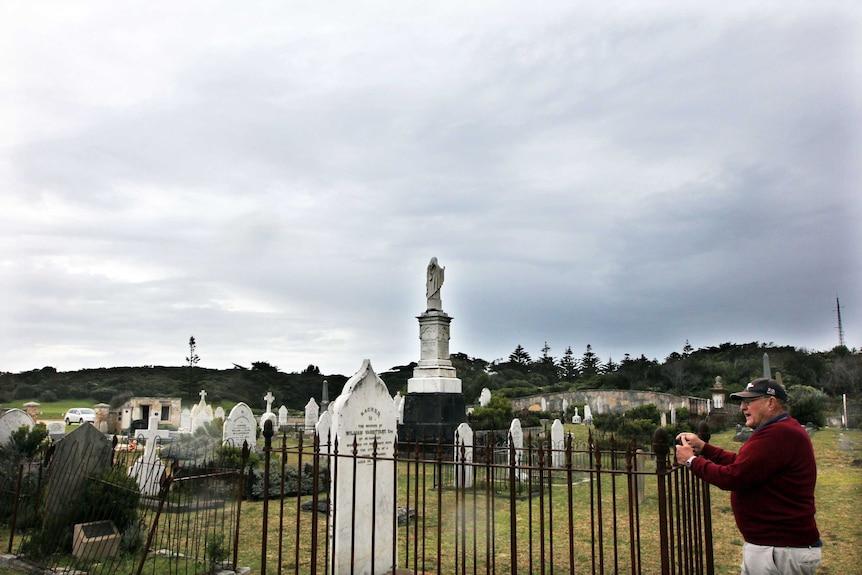 Man in a graveyard