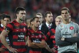 Wanderers Michael Beauchamp and Ante Covic dejected after loss