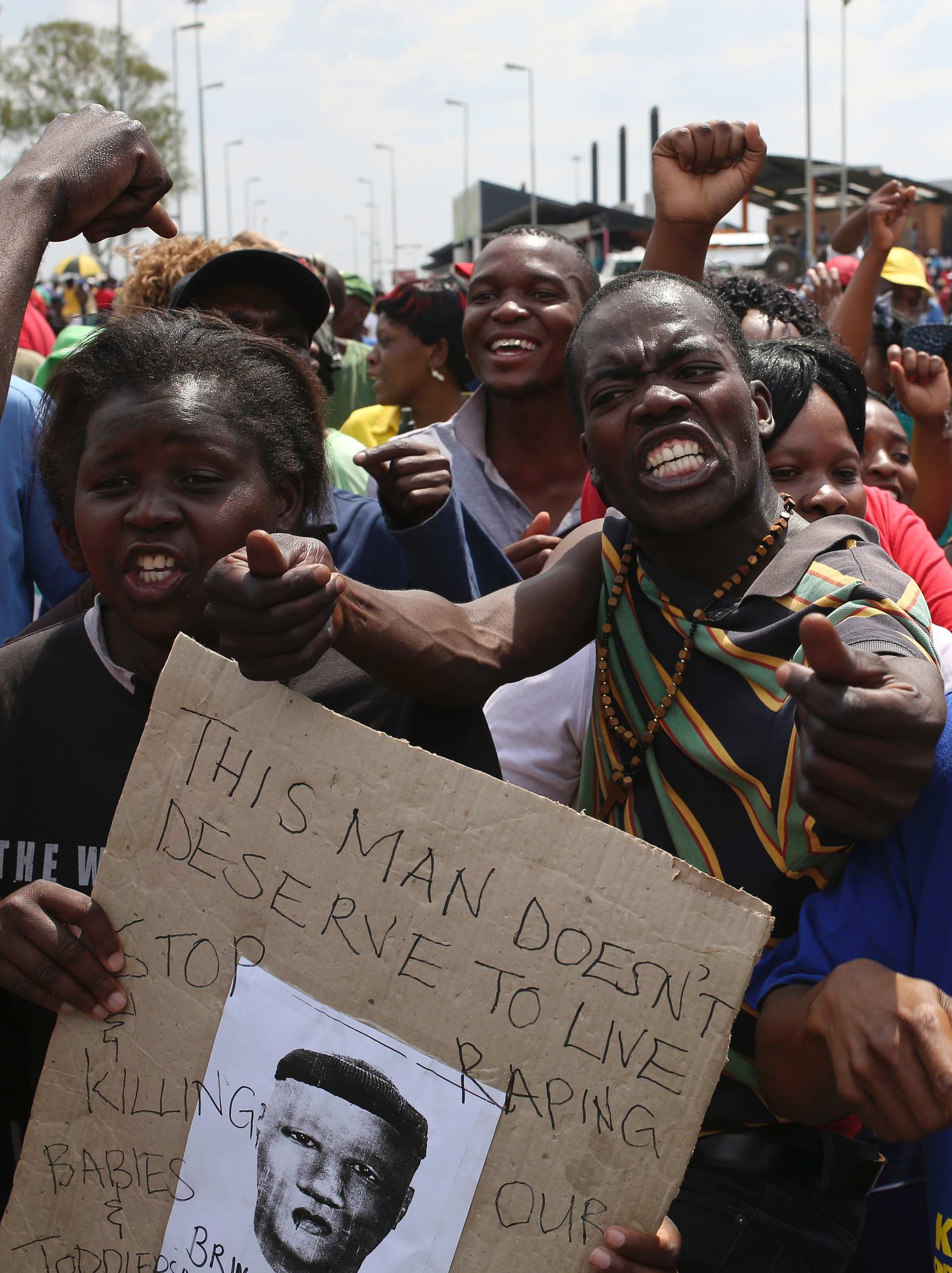 South Africans riot as fifth man arrested over rape and murder of girls ...