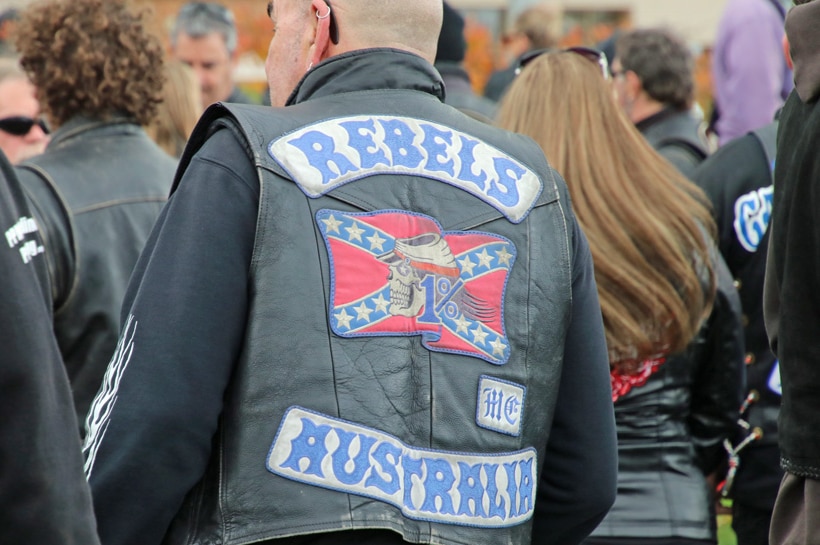 Rebels motorcycle club member wearing colours, undated image.