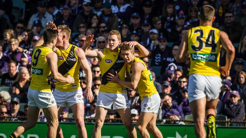 Richmond celebrate a goal against Fremantle at Subiaco Oval on August 20, 2017.