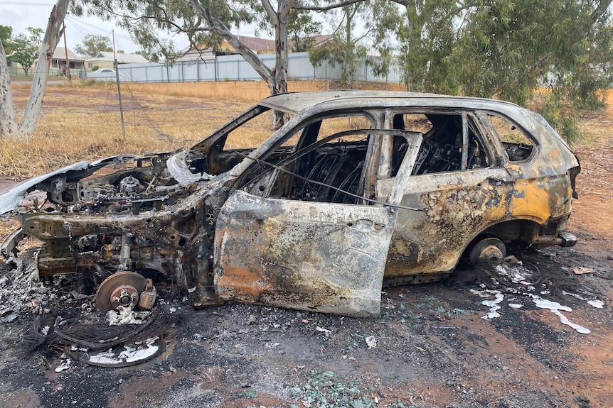 A burnt-out car.