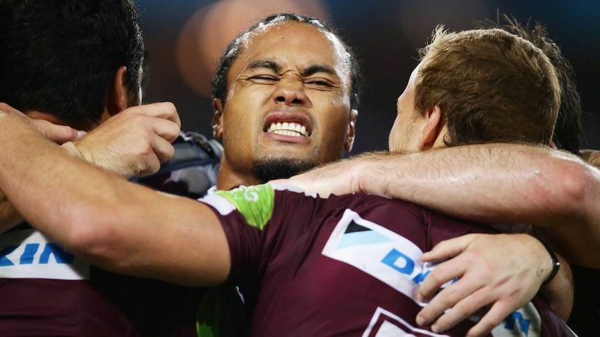Steve Matai celebrates a Manly try