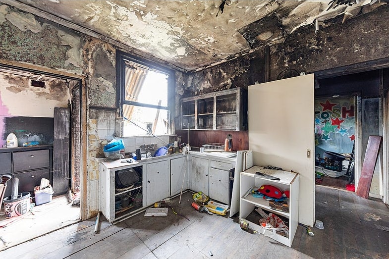The interior of a fire-damaged home.