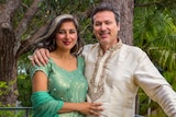 Musician husband and wife Niyati and Gavin Libotte wear traditional Indian clothing.