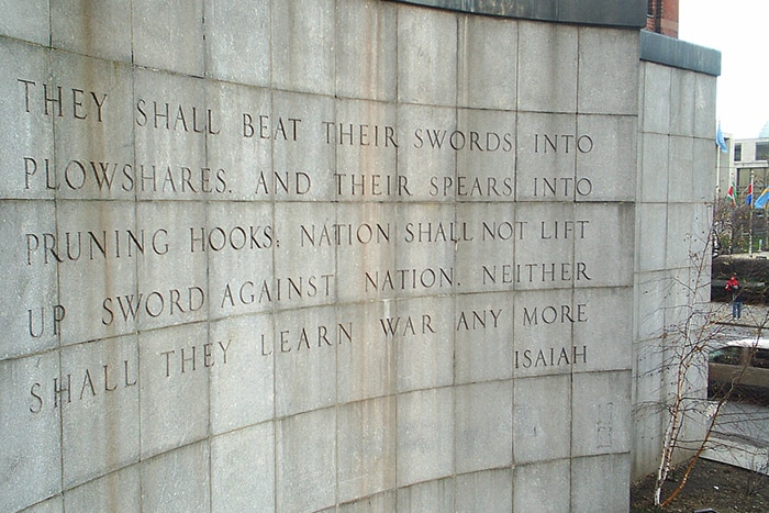 A verse carved into a stone wall