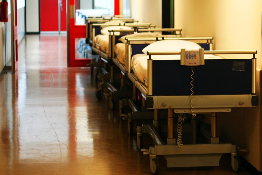 Hospital beds in a corridor. (www.sxc.hu: Woopidoo2)