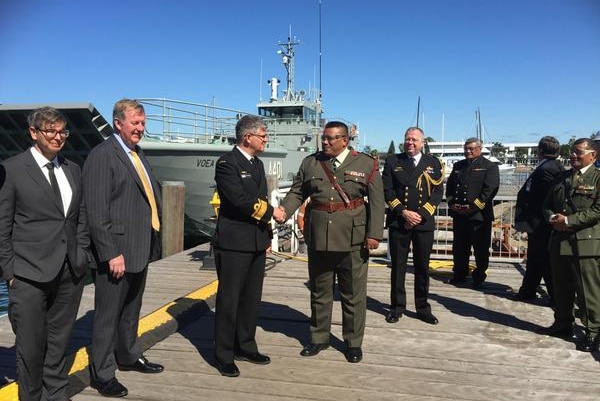 Australian and Tongan defence officials inspect the landing barge, Voea Late in Newcastle.