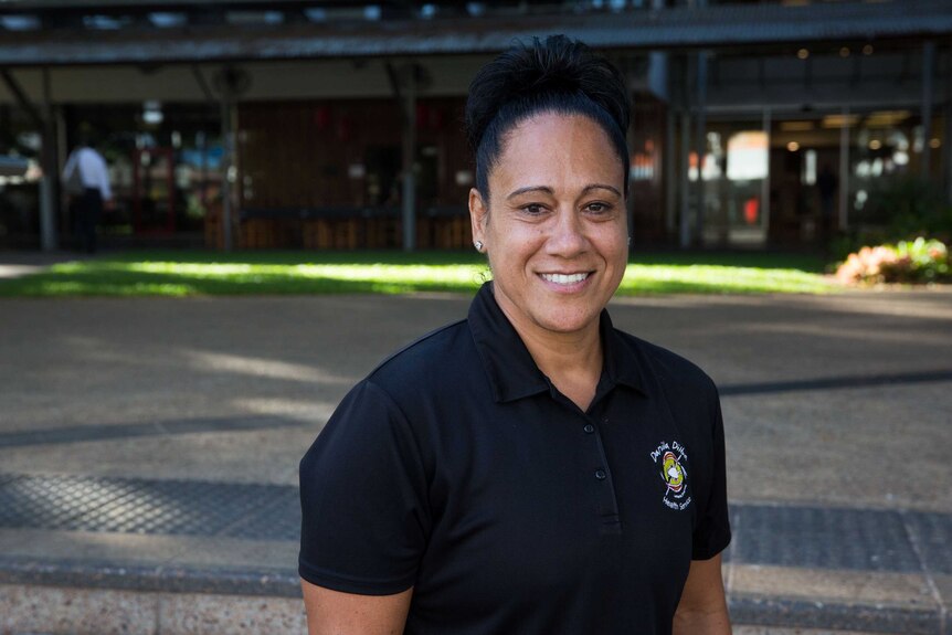 Tracey Thompson smiles at the camera.