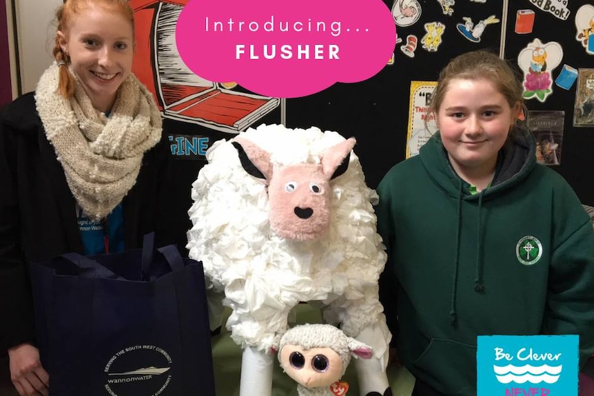 Two young girls with a toy sheep