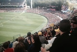 A crowd watches a game at Adelaide Oval