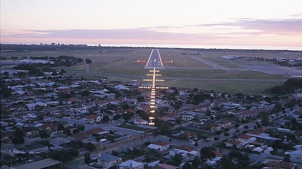 aerial view of adelaide airport from rooftops to runway