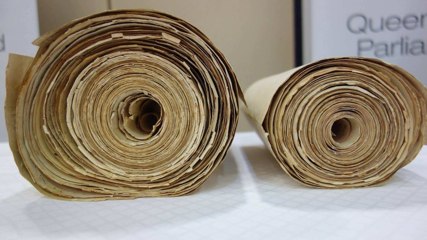 Two large rolls of ancient documents
