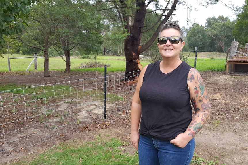 Tammy Stephenson in front of her back paddock