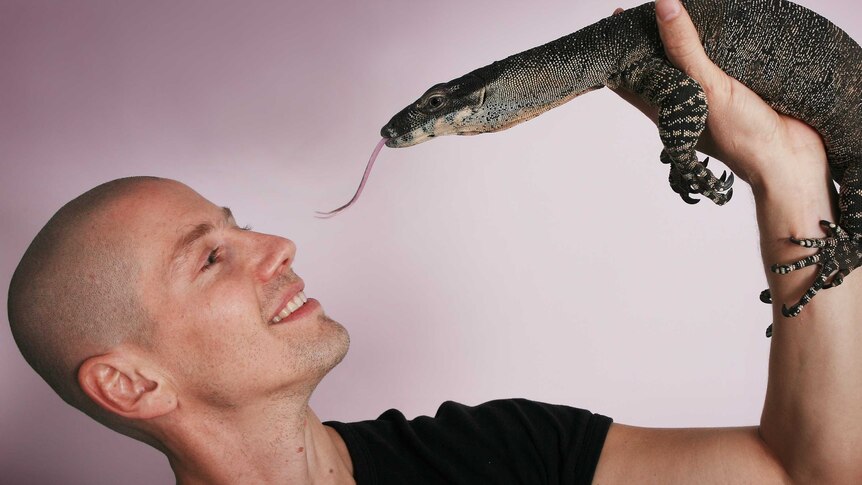 Dr Bryan Grieg Fry with lizard