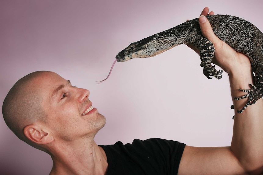 Dr Bryan Grieg Fry with lizard