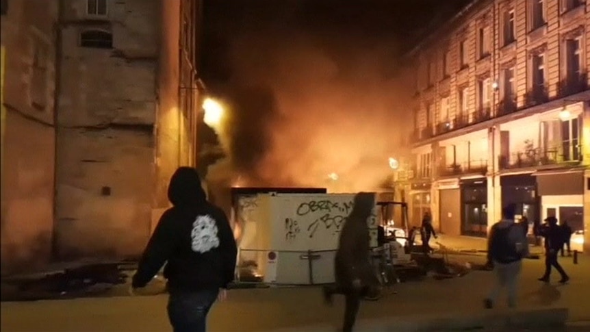 Barricades burn in central Bordeaux after violent protests.