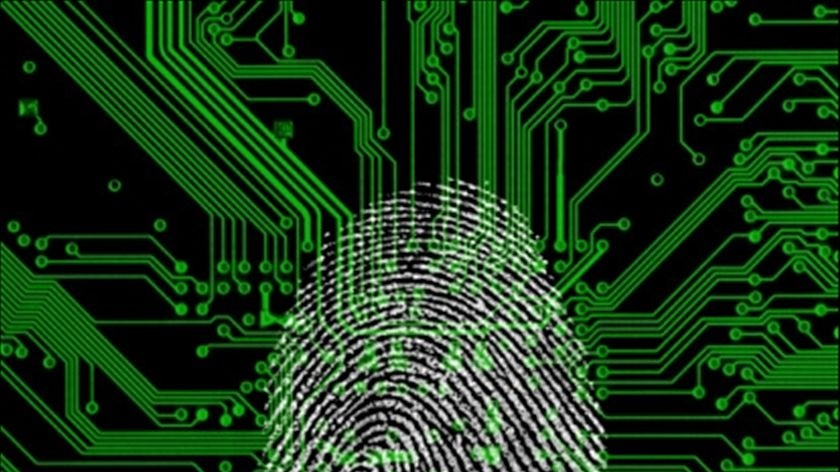 A green fingerprint over computer chip detailing pattern