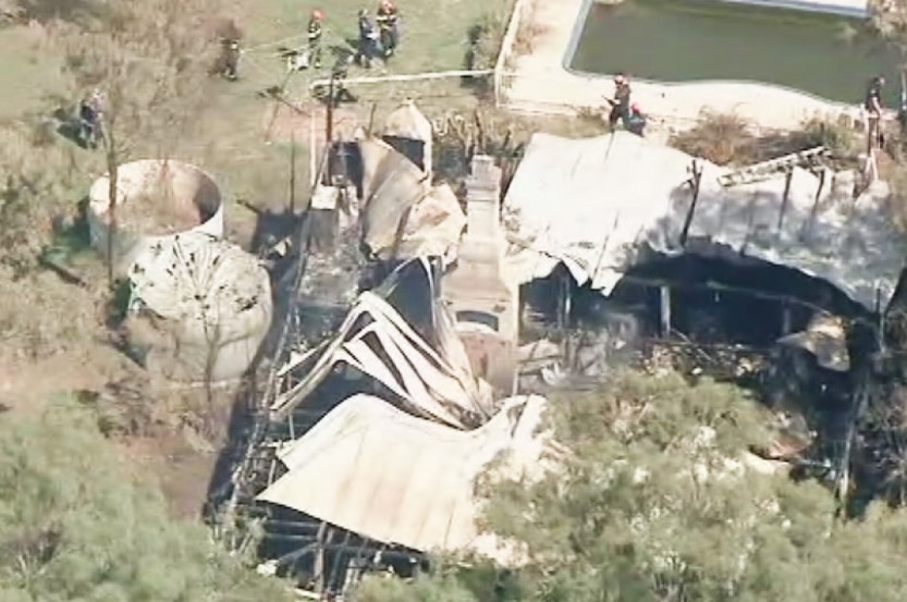 Aerial image of home destroyed by fire at Atkinsons Dam near Lowood