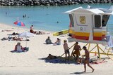 People at Cottesloe Beach during Perth's heatwave.