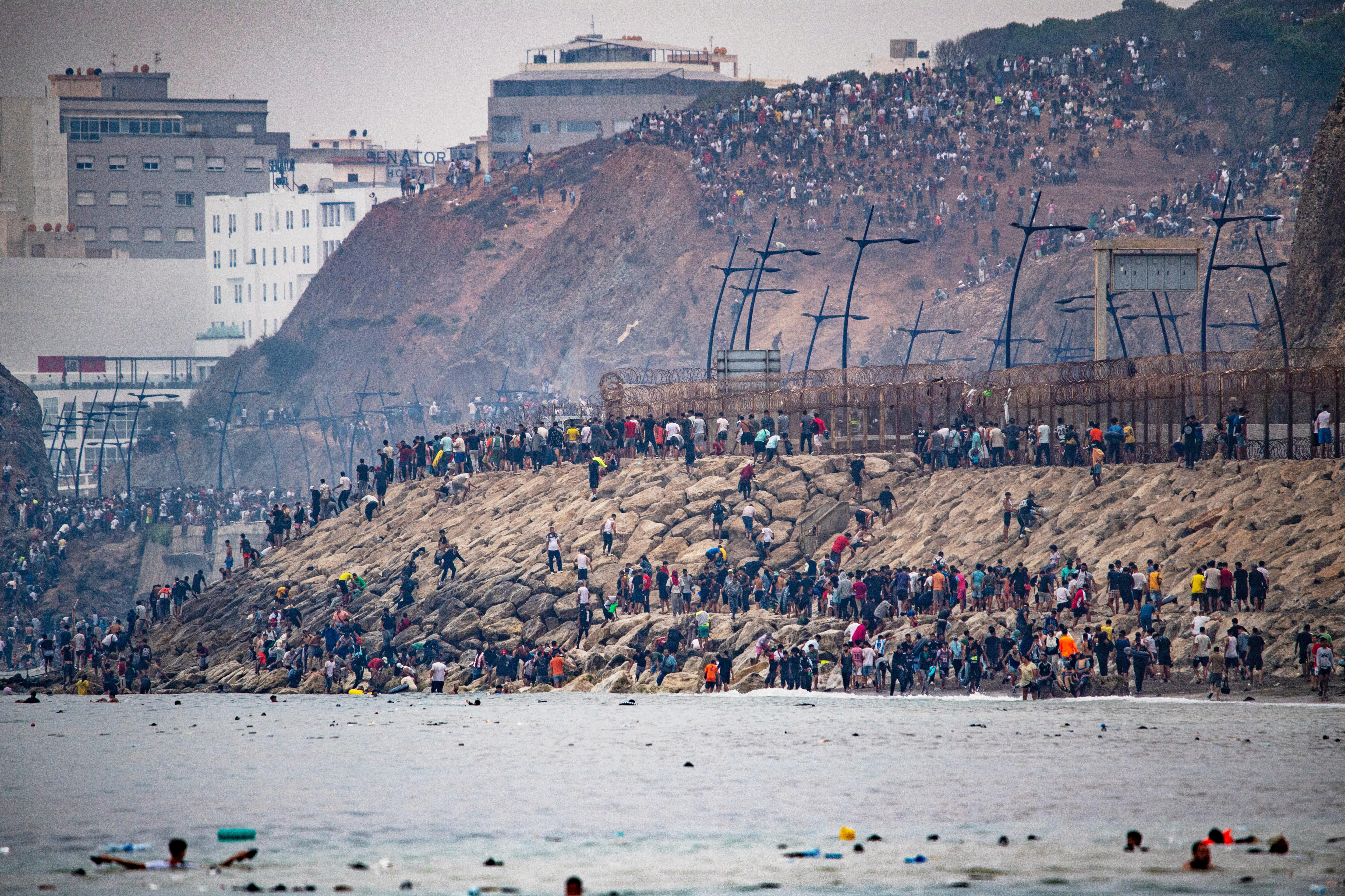 Spain says Ceuta migrant surge largely reversed as half return to Morocco