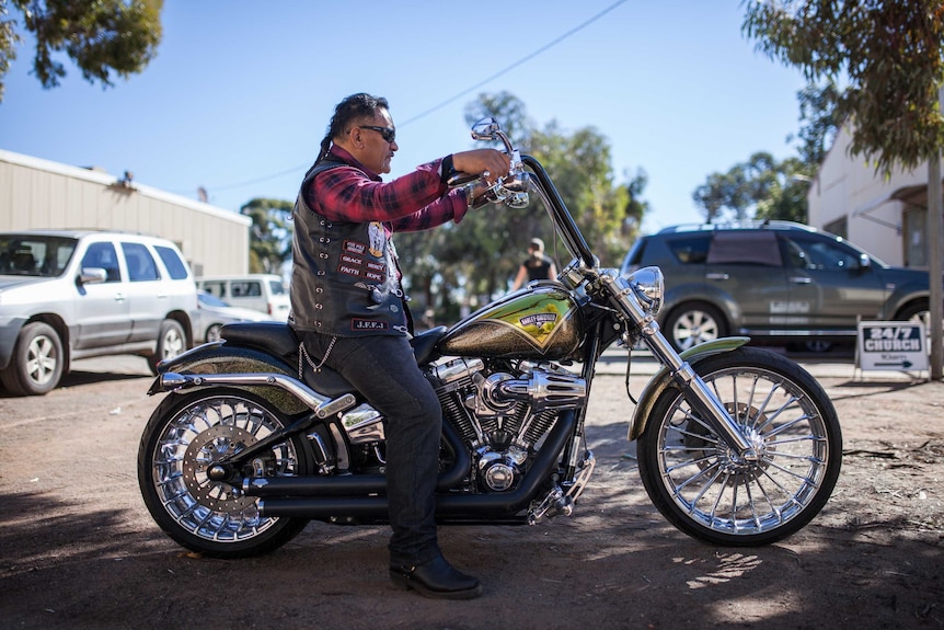 Rock of Ages pastor Wanz on his motorcycle in Kalgoorlie, WA.