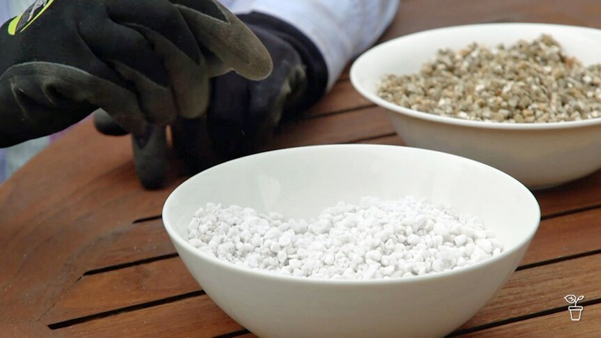 A bowl of perlite and vermiculite on a table.