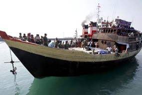 File photo: A boat carrying asylum seekers (Reuters: Dadang Tri)