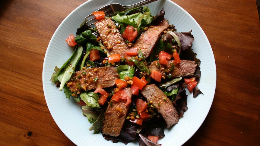 Steak and salad on plate