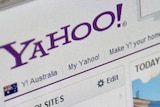 A close-up photograph of the Yahoo logo.