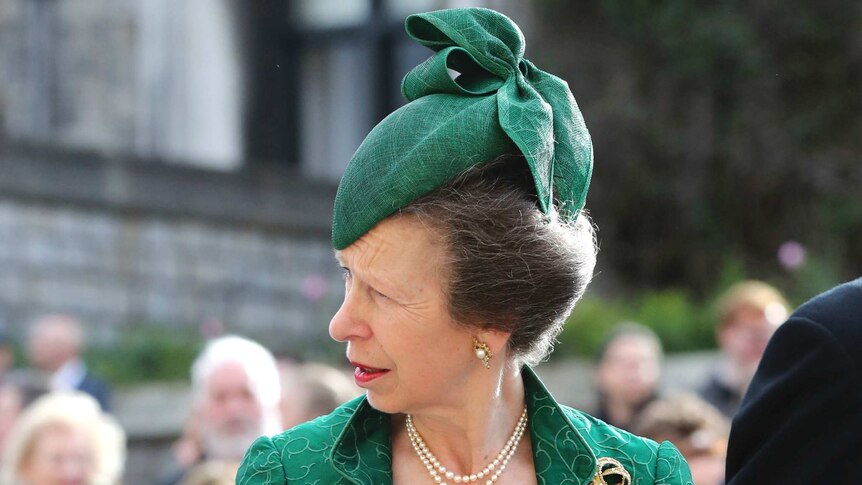 Princess Anne wears a green dress and hat as she arrives at the church