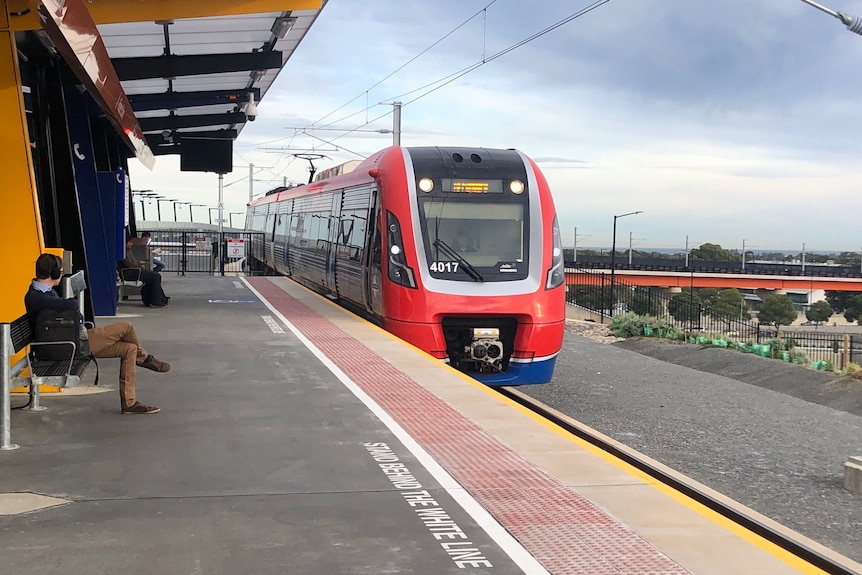 A train coming into a railway station