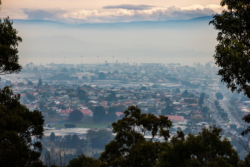 Smoke hangs over suburbs in Hobart.