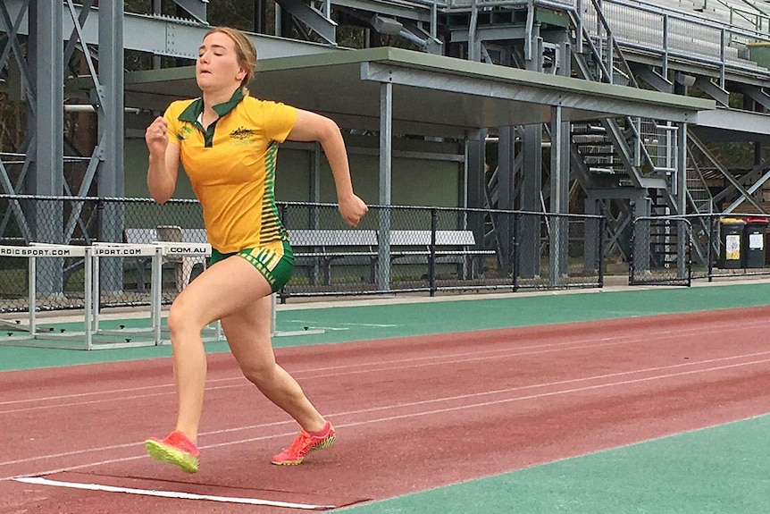 Jamie Howell, a 17-year-old Queensland track and field athlete who is hearing impaired, training on the track in November 2015