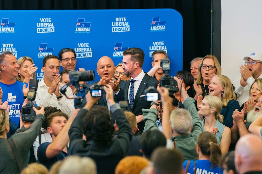 A large crowd of people on a stage.