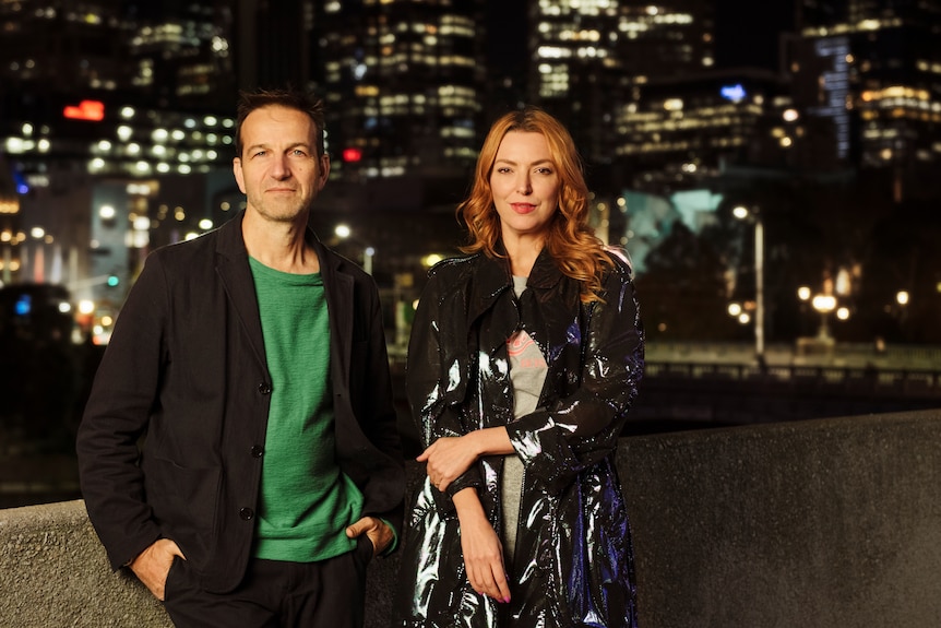 Rising artistic directors Gideon Obarzanek and Hannah Fox, a middle-aged man and young woman standing in front of melbourne city