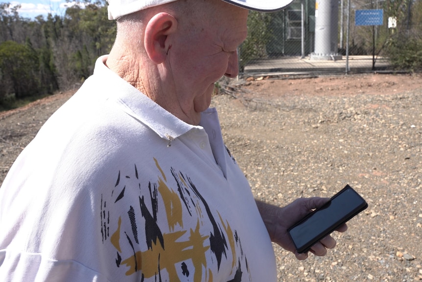 A man looking at his phone