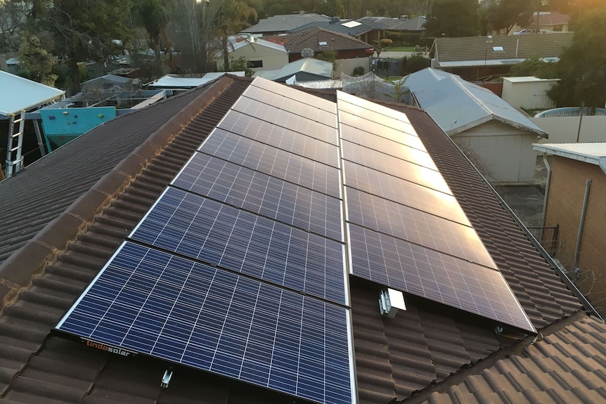 Solar panel on a roof shot from left above.