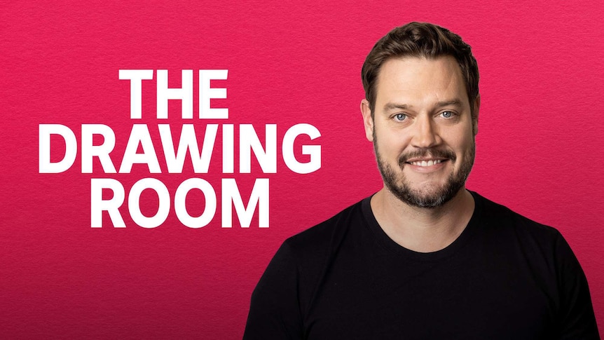 A smiling man in a black t-shirt stands in front of a pink background. Text reads: The Drawing Room. 