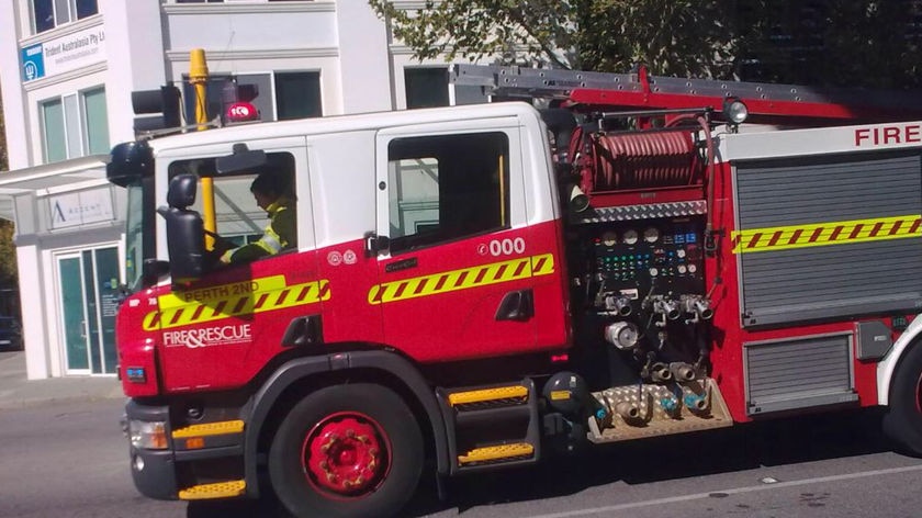 Firefighters attend a chemical spill in East Perth